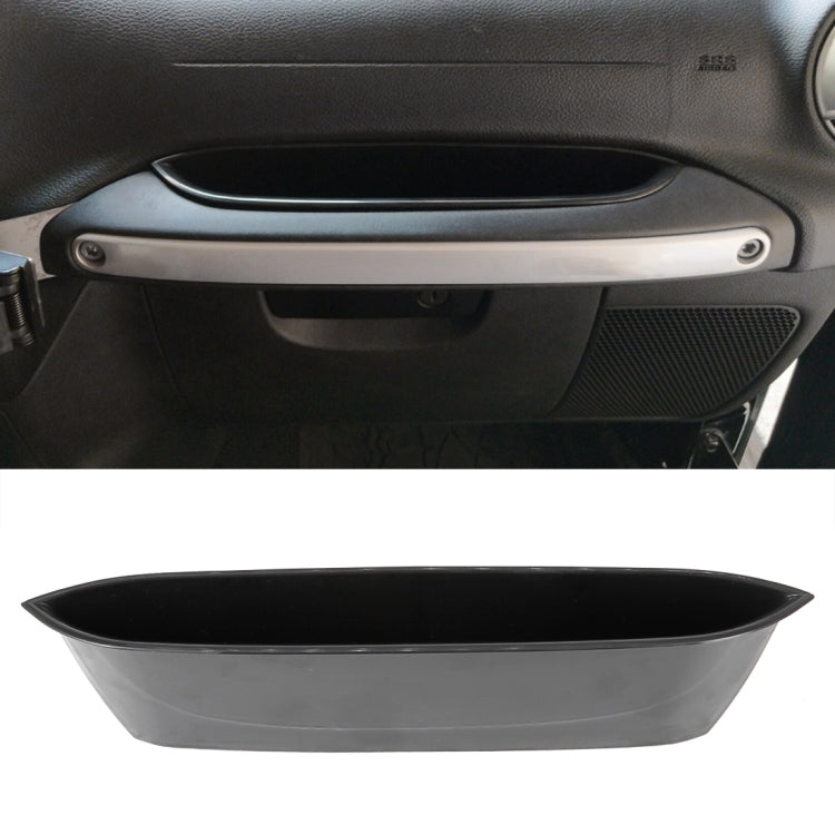 Car front passenger door handle storage tray, black, mounted in dashboard panel