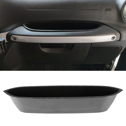Car front passenger door handle storage tray, black, mounted in dashboard panel