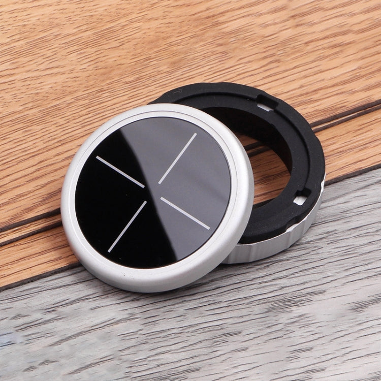 Circular knob cover, black and gray cross motif with silver edge and black housing