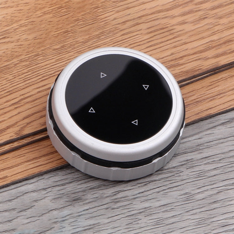 Multi-function IDRIVE knob cover with black circular face and silver ring