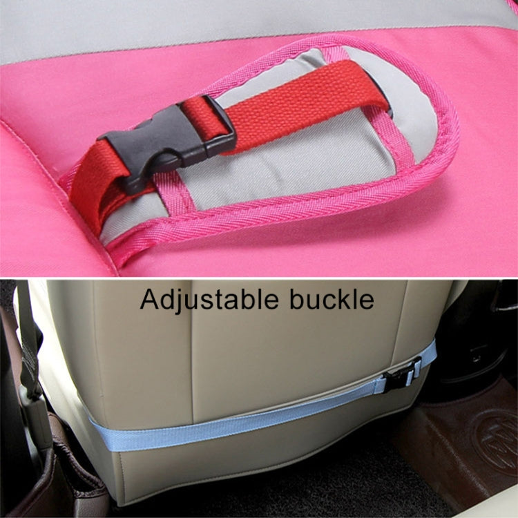 Adjustable buckle detail on pink car safety seat protective pad with red strap