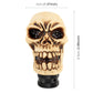 Tan skull gear shift knob, 3.8 in tall, with black ribbed base