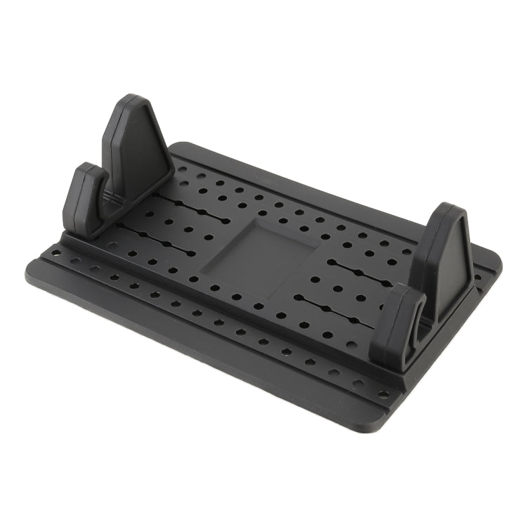 Black silicone dashboard phone mount with perforated base and raised phone supports
