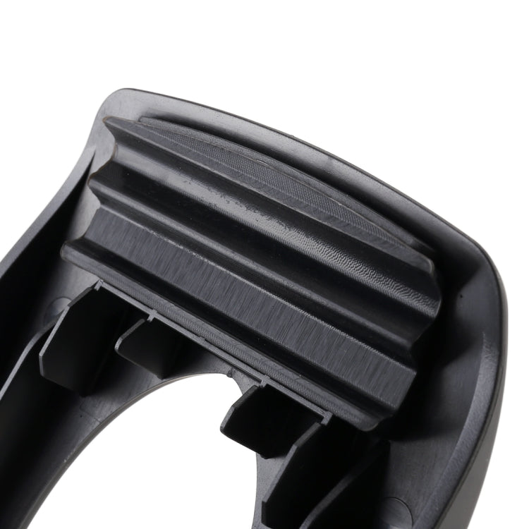 Close-up of black dashboard phone holder clamp rails and locking tabs