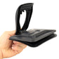 Black dashboard phone holder held open by hand for inserting a smartphone