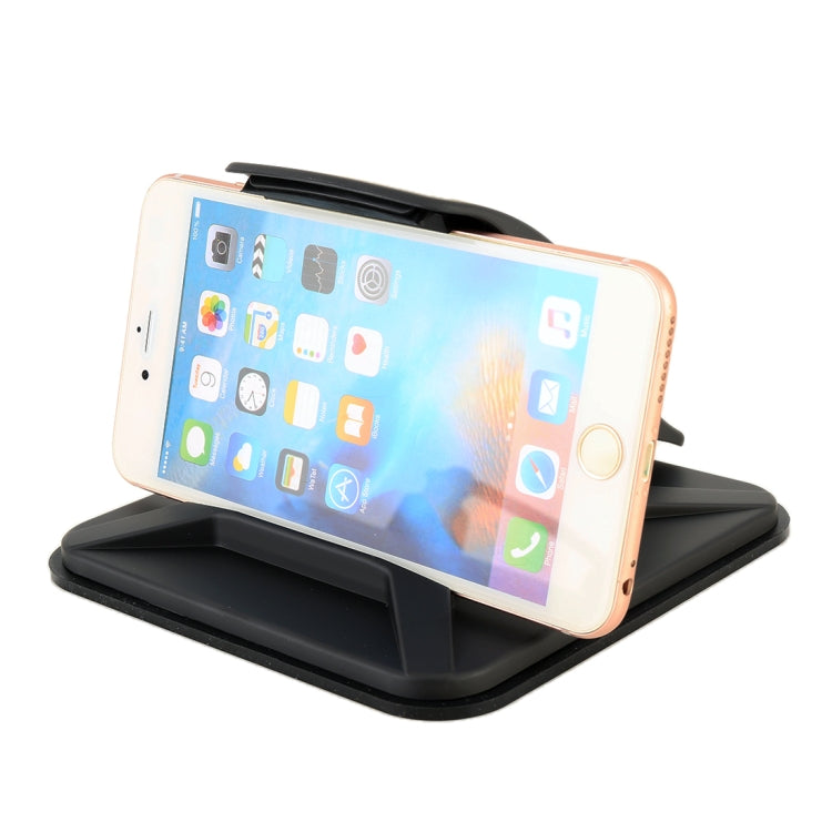 Black car dashboard phone holder holding a smartphone in landscape position