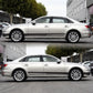 Car side stripe PVC sticker, black horizontal stripe on a silver sedan side panel