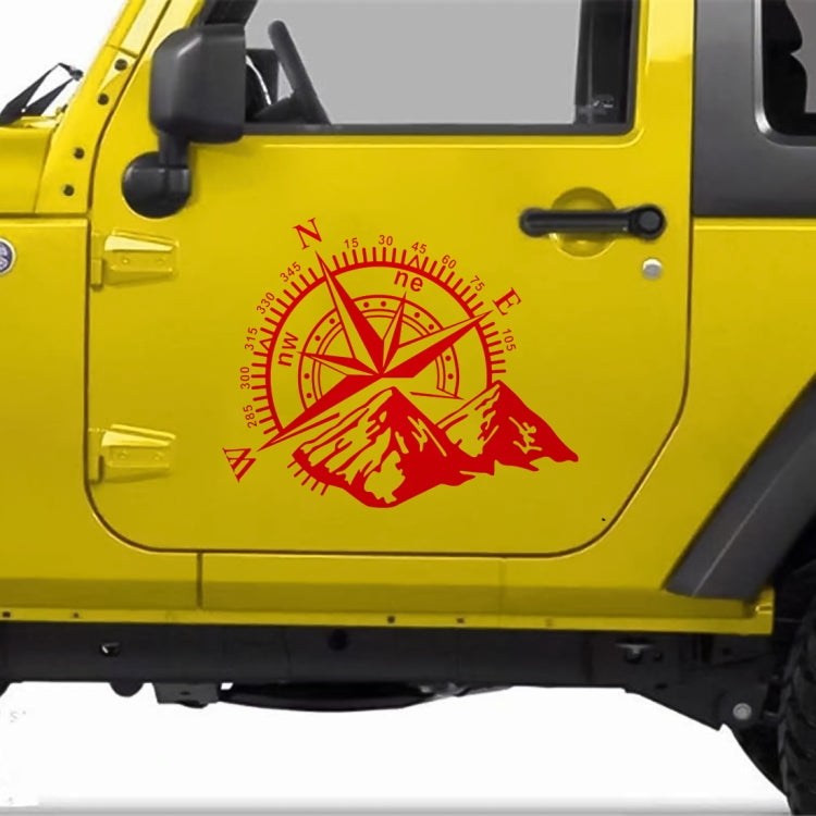 Red compass rose and mountain PVC car sticker on a yellow vehicle door