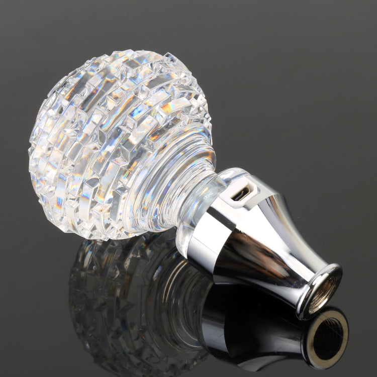 Faceted crystal gear shift knob with clear multi-edge top and chrome mounting ring