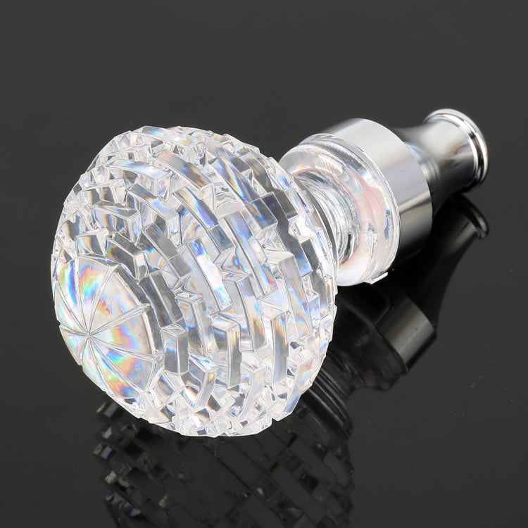 Clear faceted crystal gear shift knob with chrome stem and rounded base