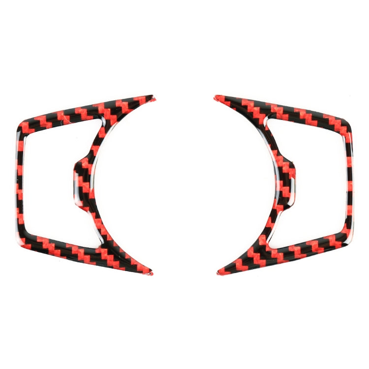 Pair of carbon-fiber style trim pieces with red zigzag edging and circular cutout