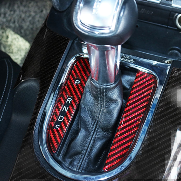 Installed gear position carbon fiber stickers, red chevron strips on shifter console