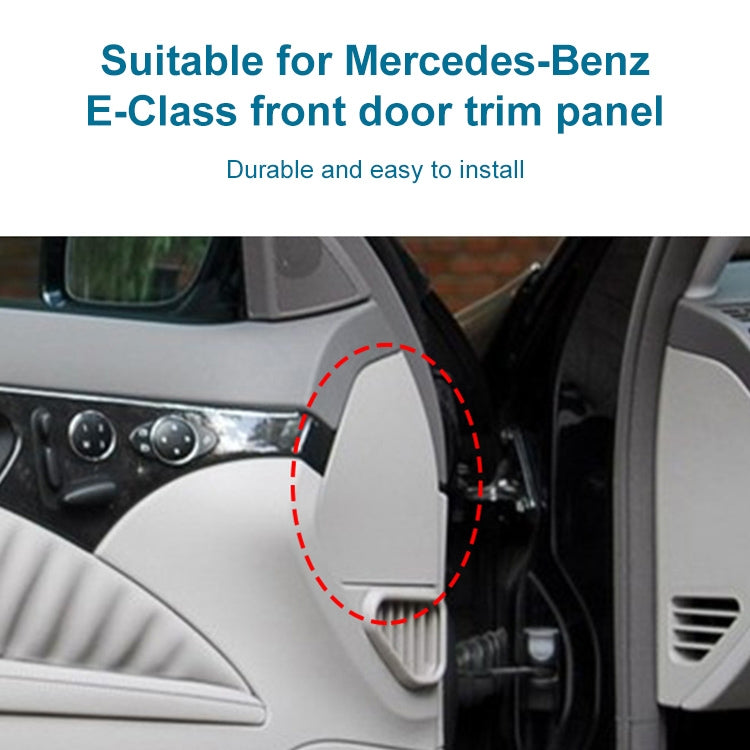 Installed front door trim panel cover, light gray textured plastic