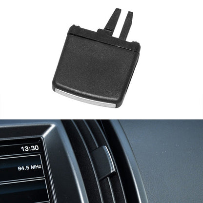 Black car air conditioning exhaust switch paddle with two mounting prongs
