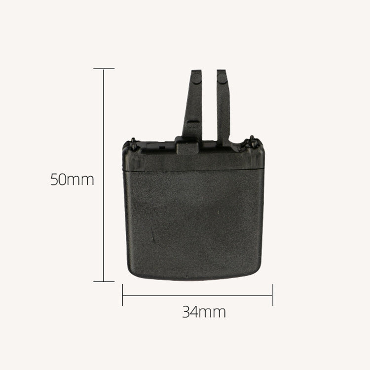 Black switch paddle measuring 34 x 50 mm, with two mounting prongs