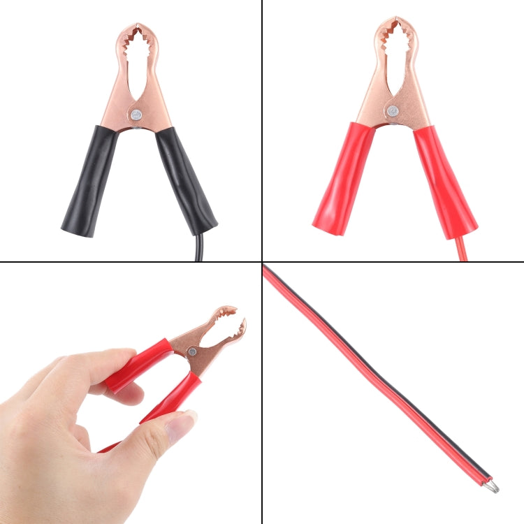 Car charging cable set with crocodile clips; hand holds red clip in detail