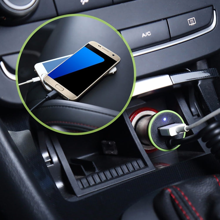Car charging setup: phone connected to USB port of mini car charger in socket