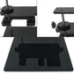 Close-up of black adapter stand clamps, vertical posts, and base platform