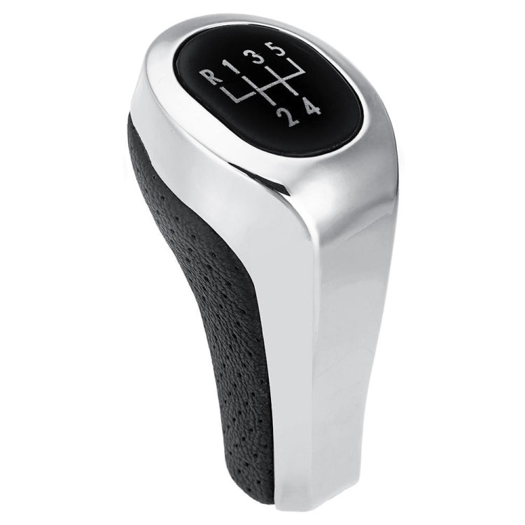 Matte silver 5-speed gear shift knob with black leather grip and numbered shift chart