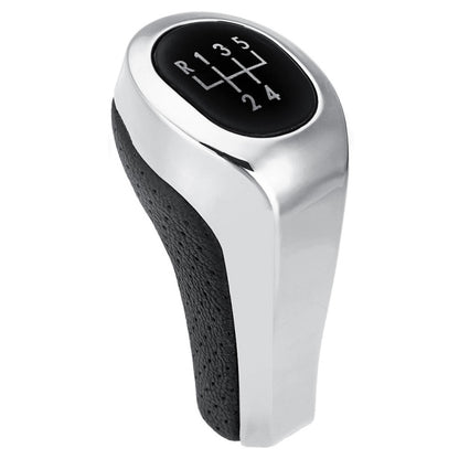 Matte silver 5-speed gear shift knob with black leather grip and numbered shift chart