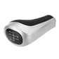 Matte silver gear shift knob with black leather grip and 5-speed gear position markings