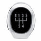 Matte silver gear shift knob face with 5-speed shift pattern and etched numbers