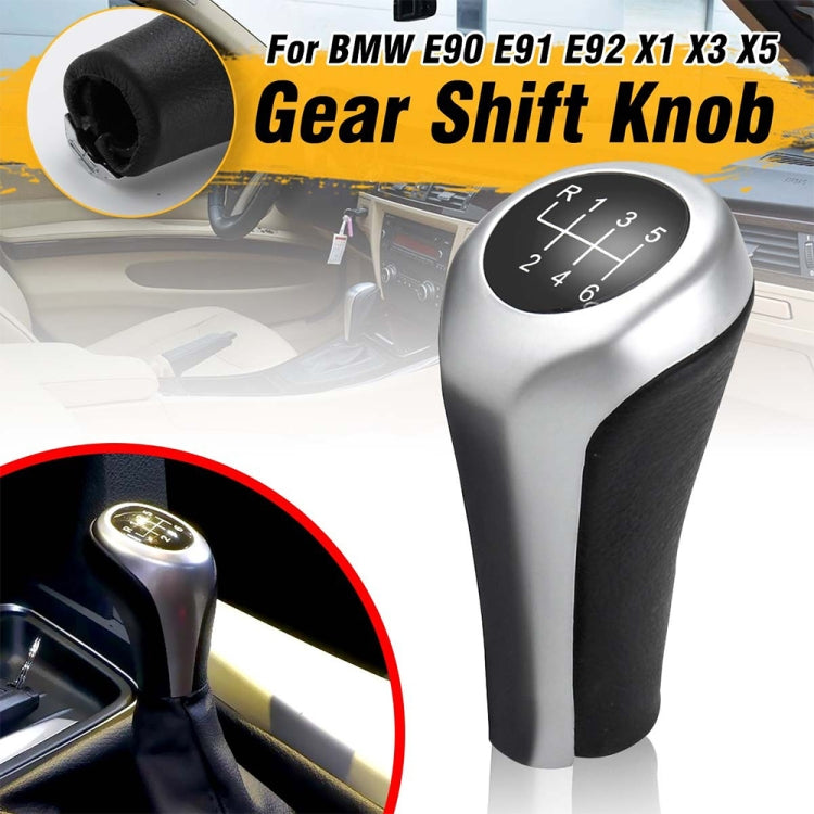 Matte silver gear shift knob with black leather grip and etched shift diagram