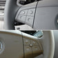 Steering wheel left 4-button switch panel shown in grey and coffee colors