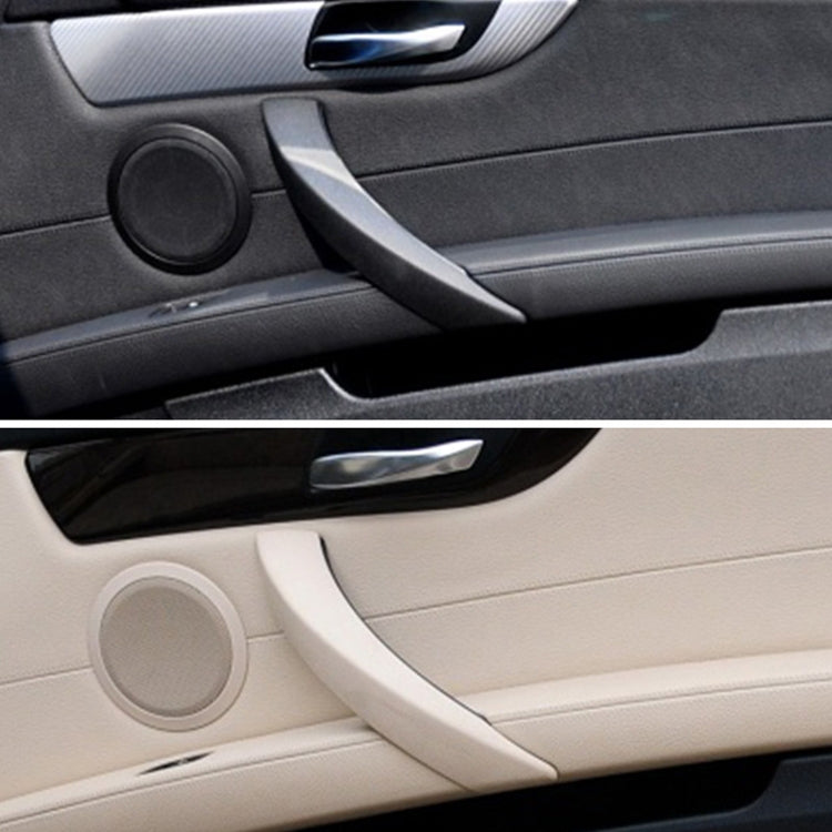 Car interior door handle pull trim inserts, black and beige installed on doors