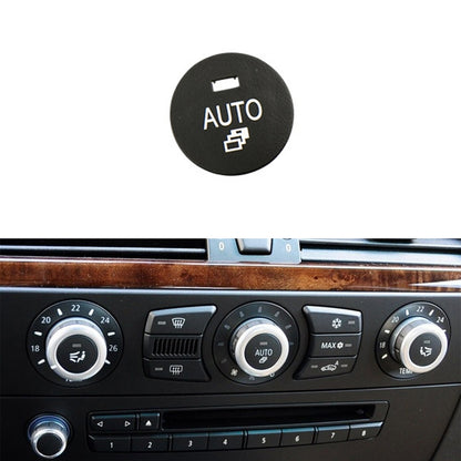 Round car air conditioner AUTO button with vent icon on black face