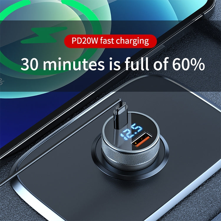 Black dual-port car charger with blue digital display and illuminated USB ports