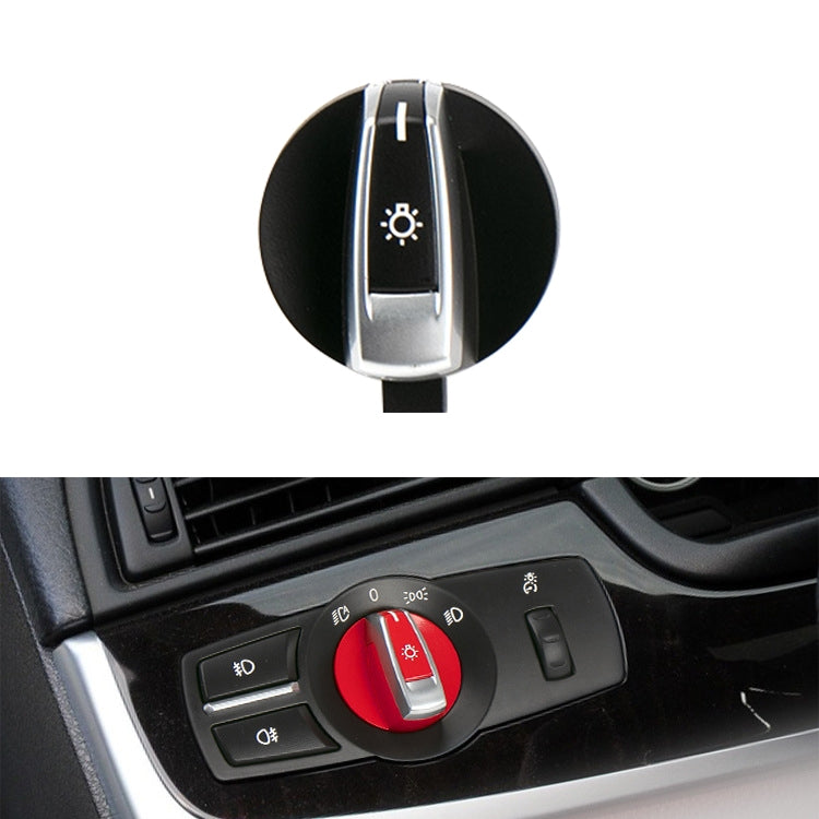 Red headlight switch knob with silver trim and light icon dial