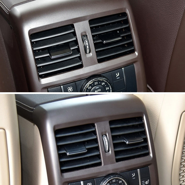 Car rear air conditioner vents, black adjustable slat grilles in dashboard