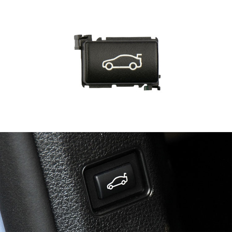 Black car trunk switch button with white outline car icon, rectangular rocker