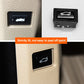 Car trunk switch button installed in beige dashboard panel, black bezel and white icon