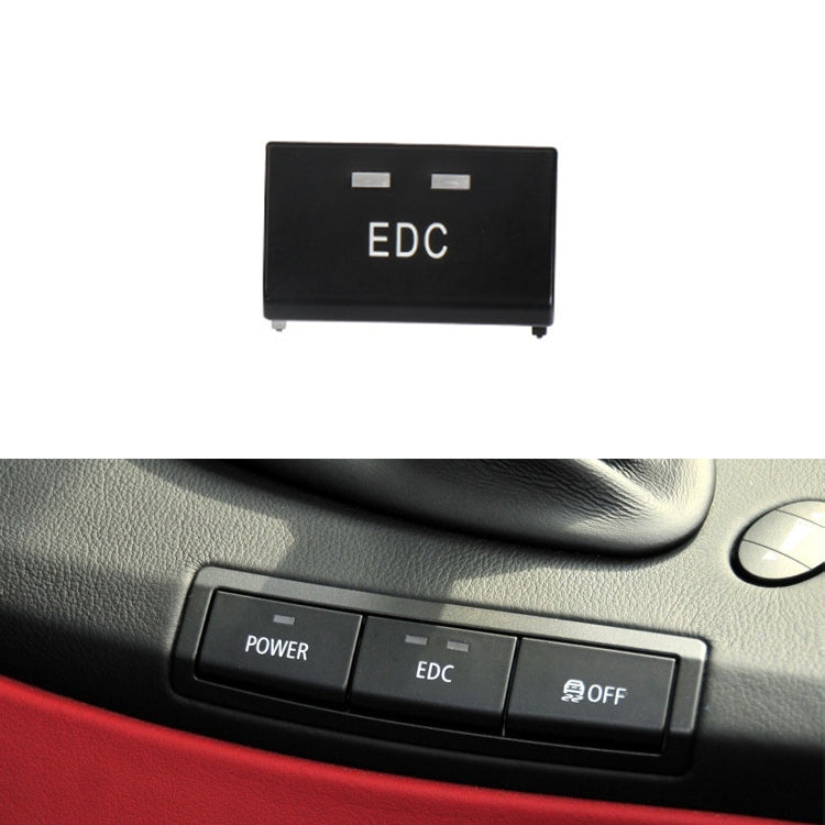 Center console EDC switch button, black with white EDC lettering