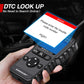 OBD2 code reader scan tool in hand with screen prompt and OBD cable, black