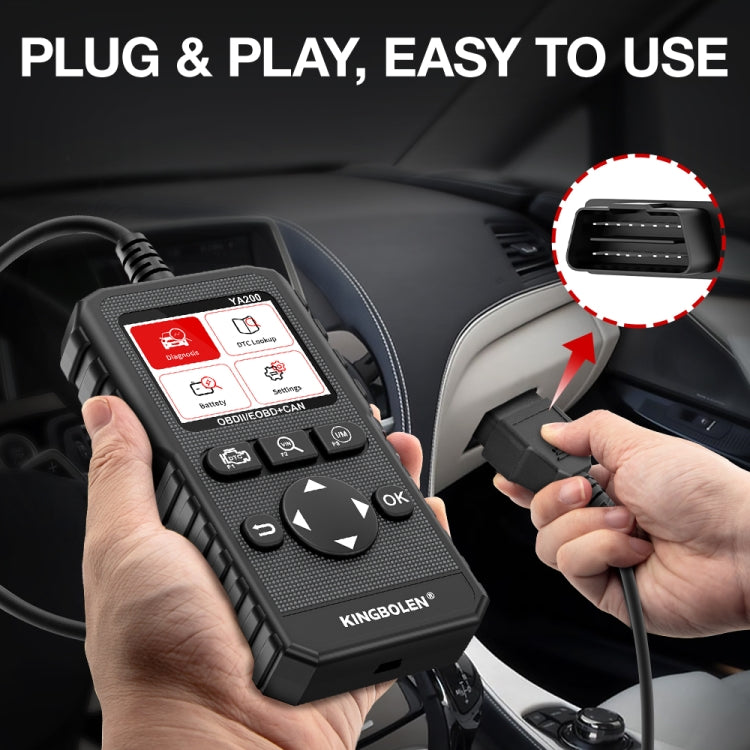 OBD2 scan tool connected via OBD plug, held in hands, black handheld device