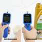 Blue oil tester held in hand with LCD display and metal probe tip for oil checking