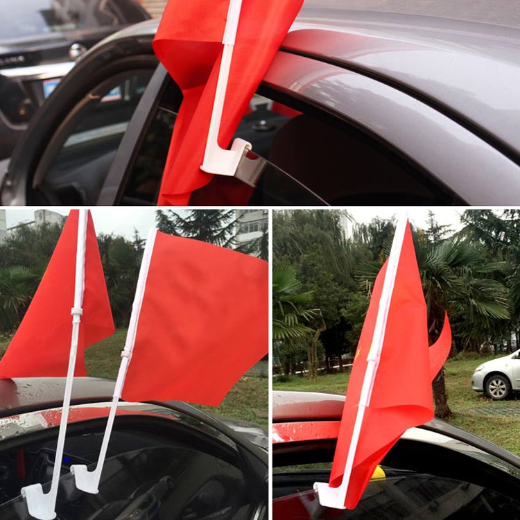 Car window flagpole set with multiple clips holding red flag cloth on vehicle windows
