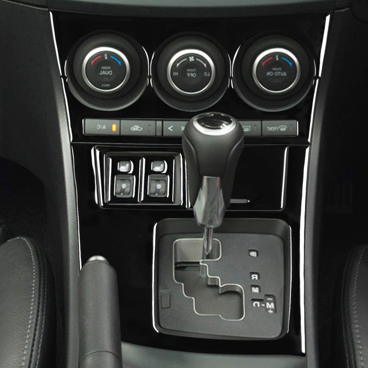 AC gear frame sticker installed on center console with chrome buttons and trim