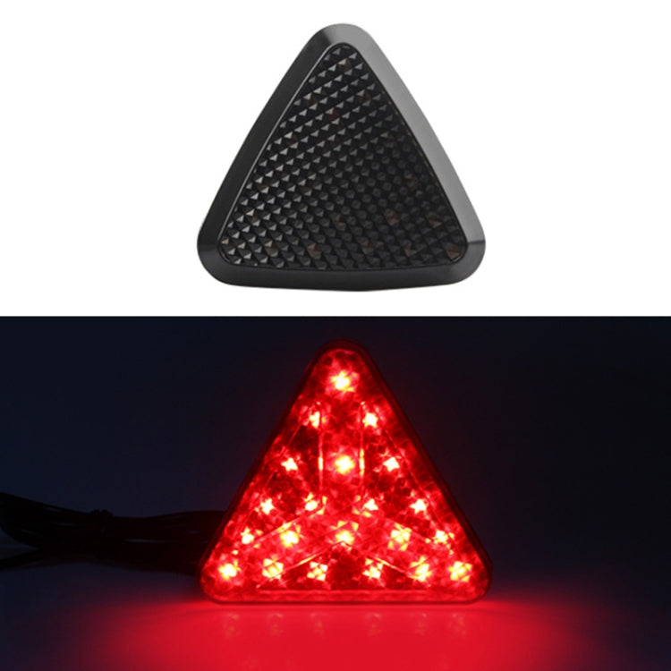 Triangle LED bike tail light with black housing and red lens, unlit