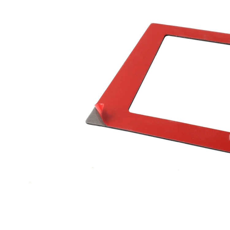 Carbon fiber-look navigation frame edge with rectangular cutout, red backing