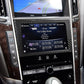 Installed carbon fiber-look navigation frame around car media screen, dark gray weave