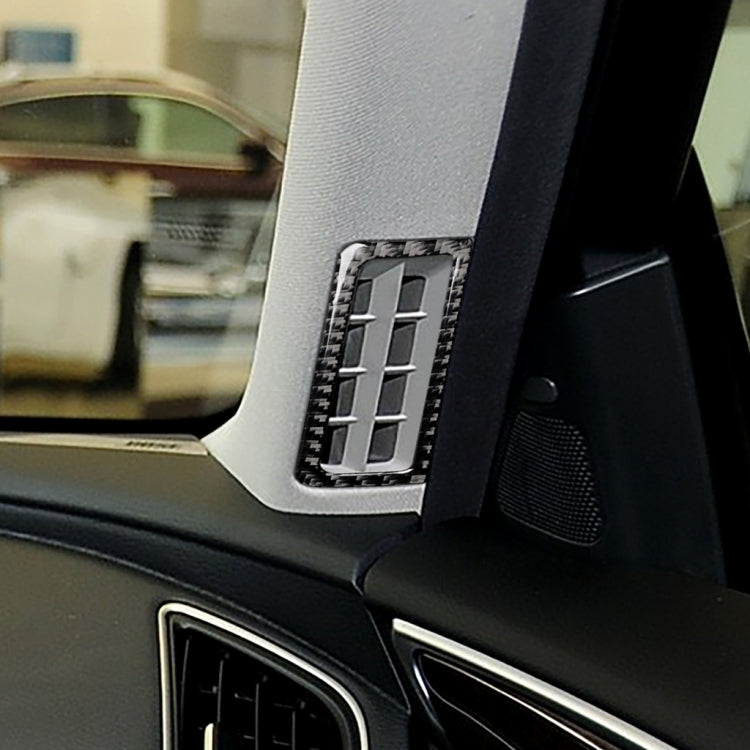 Installed carbon fiber-look A-pillar air outlet frame trim with vent cutout