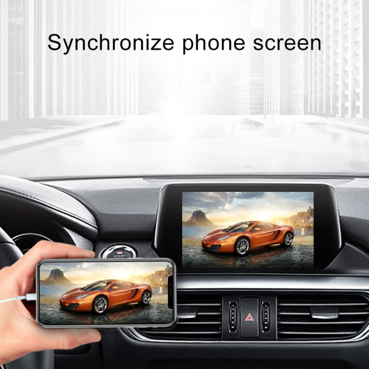 Wireless CarPlay/Android Auto adapter displaying synced phone screen on car monitor