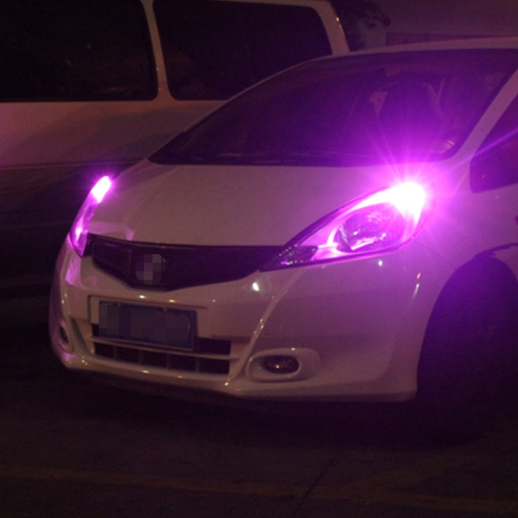Pair of T10 LED clearance bulbs emitting purple-pink light
