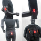 Red LED magnet clip safety light attached to black running sleeve