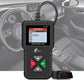 Handheld OBD2 scanner showing fault menu screen near car steering wheel.