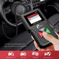 Handheld OBD2 scanner held in hand with green OK and red control buttons.